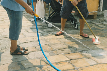 Cleaning and washing a city street