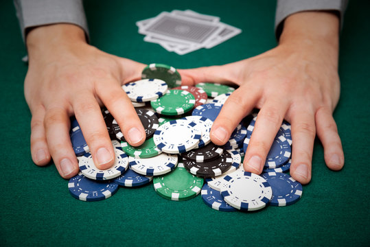 Man plays poker in the casino