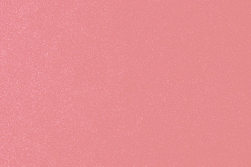 Unfocused abstract pink background with sequins