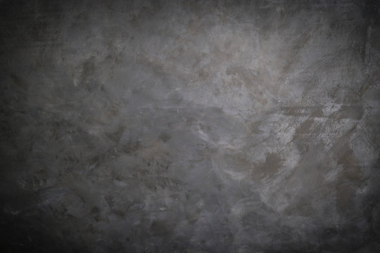 Dark grey artistic canvas backdrop. Abstract stained background. Textured art wall.