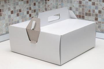 White cardboard cake box