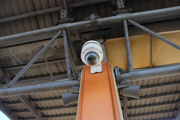 train station lamp and loudspeaker hanging