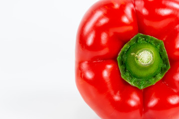 detail of a red capsicum fruit illustrating a healthy lifestyle isolated on white background