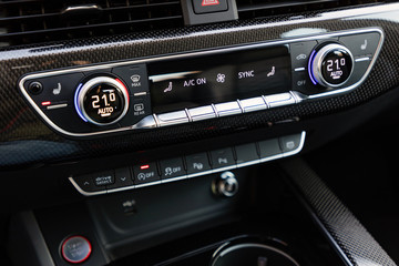 Control buttons on dashboard of a car