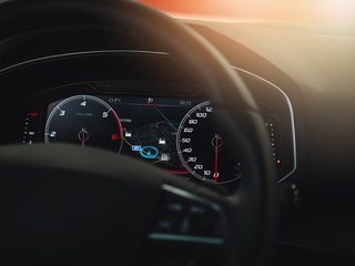 The sign and symbol on car dashboard. Car speedometer closeup. Car interior.
