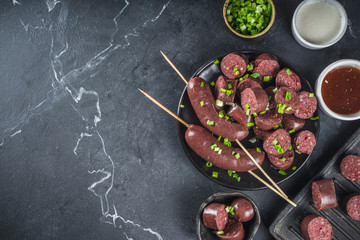 Korean traditional national food. Street home Asian cuisine. Sliced blood sausage soondae or...