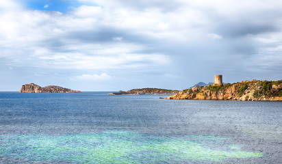 Fantastic morning view  of Teulada bay with turquoise sea and famous coastal tower Torre del Budello