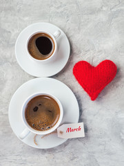 The concept of the March 8 women's day. Top view of two cups of coffee in the shape of the number 8
