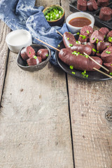 Korean traditional national food. Street home Asian cuisine. Sliced blood sausage soondae or...