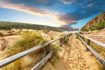 Charming view of beach Cala Domestica  with marvelous sand dunes.