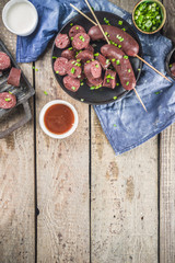 Korean traditional national food. Street home Asian cuisine. Sliced blood sausage soondae or...