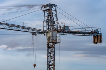 Fototapeta na wymiar Old crane at a construction site in Sweden