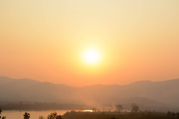 Obraz na płótnie Canvas Natural sunset through the Mekong River