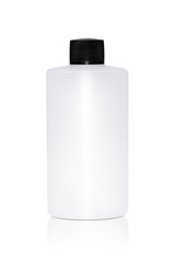 white plastic bottle with black cap isolated on white background with reflection