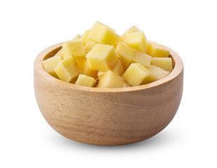 ginger with slices in wood bowl on white background