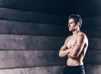 Brutal strong bodybuilder athletic fitness man.