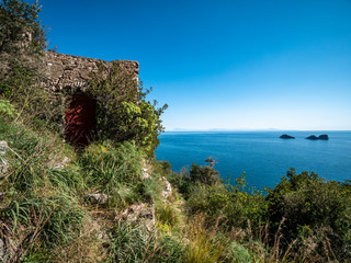 rural house on the Tyrrhenian sea and Li Galli islets in the background. Amalfi Coast, Campania,...