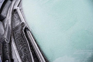 Closeup of frozen car windshield on a cold winter day