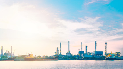 Fototapeta na wymiar Oil refinery or petrochemical industry with ship in thailand. for Logistic Import Export background.