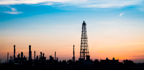 Obraz premium Oil refinery or petrochemical industry with ship in thailand. for Logistic Import Export background.