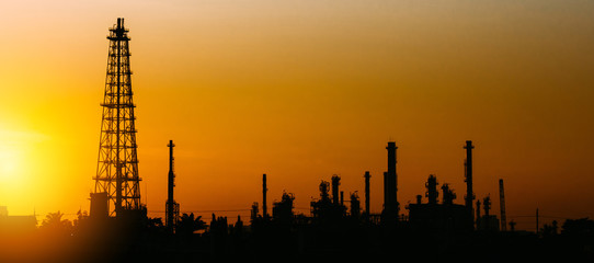Obraz premium Oil refinery or petrochemical industry with ship in thailand. for Logistic Import Export background.