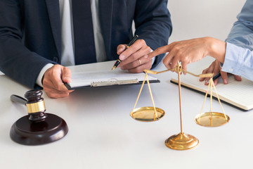 Male lawyer or judge consult with client check contract papers recommend legal proposals, Law services concept