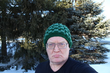 man in winter forest