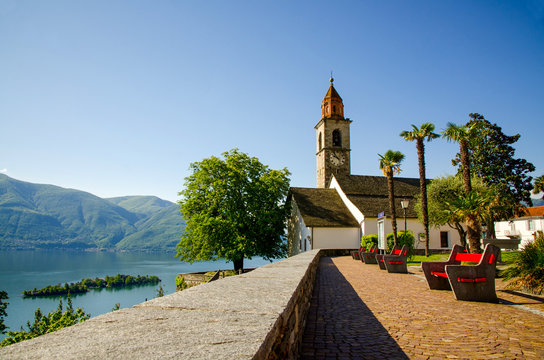 Church and Brissago Islands on an Alpine Lake Maggiore with Mountain in Ronco sopra Ascona, Switzerland.