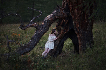  Girl near the larch.