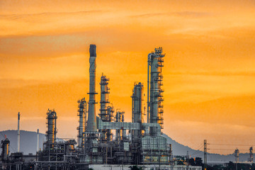 Obraz na płótnie Canvas Aerial view oil refinery night background during twilight,Industrial zone,Energy power station.