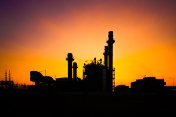 Fototapeta na wymiar Glow light of petrochemical industry on sunset and Twilight sky ,Power plant,Energy power station area