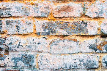 Vibrant abstract wallpaper, banner. Red, white vintage brick wall with damaged paint.