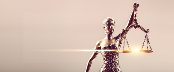 Bronze sculpture of Themis blind and holding empty balance