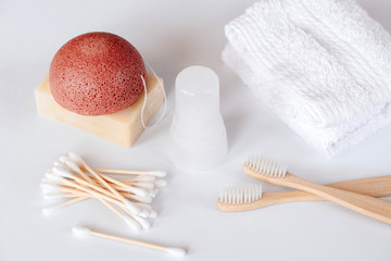 Zero waste bathroom accessories, natural eco bamboo toothbrushes, coconut soap, konjac sponge, bamboo ear sticks and crystal eco deodorant. Plastic free beauty essentials.