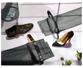 Arrangement of striped pants with coordinating belts and shoes