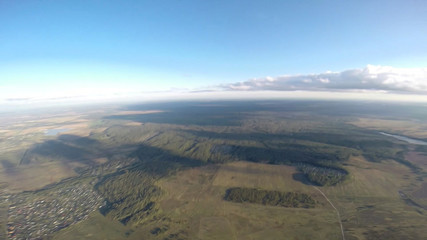 Planet. Skydiver travels around the world. There are no rules for brave people. The sky without borders.