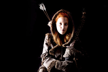 female archer posing
