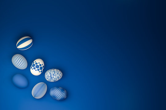 Easter Eggs with different textures in classic blue on a seamless blue background. High angle view