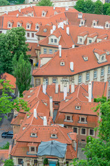 Fototapeta na wymiar View of the top of old buildings with red roof at Prague city Czech republic.