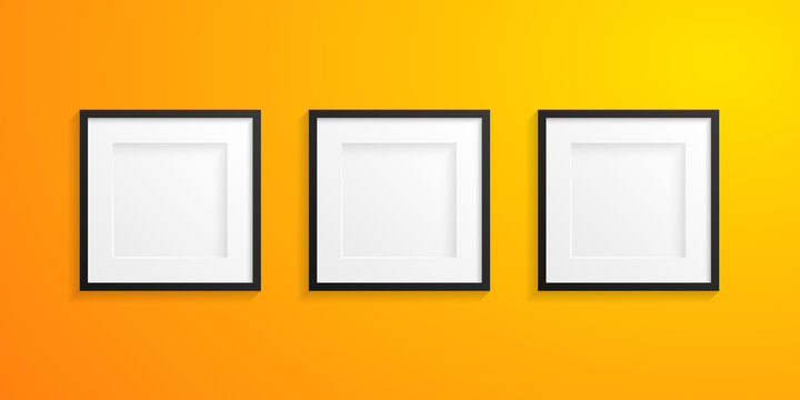Front view of three realistic and modern white frames with black edge on a yellow colored wall - Mock-up - Free space for designer