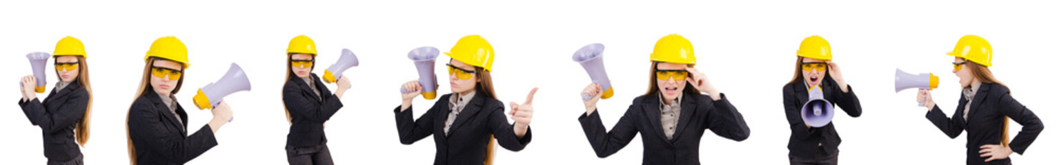 Female construction worker with loudspeaker isolated on white