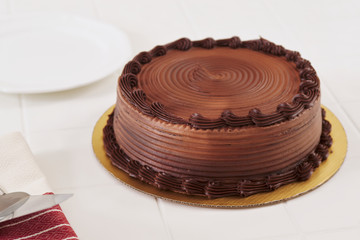 chocolate cake on white table 