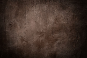 grunge brown background or texture with dark vignette borders
