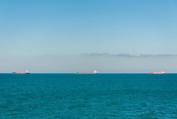 Three ships on the black sea horizon