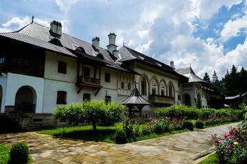 Fototapeta premium The Putna monastery is a Orthodox monastery, one of the most important cultural, religious and artistic centers established in medieval Moldavia, built and dedicated by Stephen the Great. 