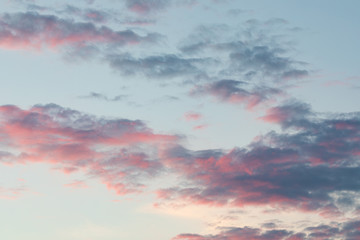 Calm pink clouds sky cloudscape at dusk