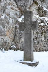 Inscribed stone cross, similar to the one guarding the sarcophagus for the heart of the Queen Mary....
