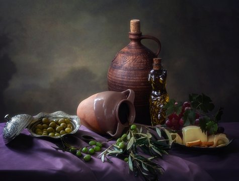 Still life with olives and cheese