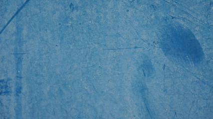 The surface of the metal blue cabinet .