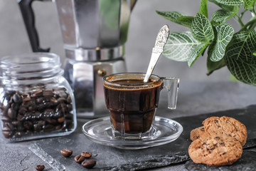 Photo of Coffee bean cookies with espresso coffee. Gray background. Various Cookies. Roasted bean. Vintage style.